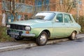 Bucharest, Romania, 3 March 2021 Old retro vivid green Romanian Dacia 1300 classic car parked in a street in a sunny spring day