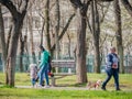 People out for a walk or stroll in Drumul Taberei park in Bucharest