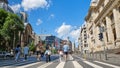 Car free zone on Calea Victoriei street, with pedestrians, cyclists, and people on scooters enjoying a sunny weekend day.