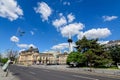 Bucharest, Romania, 6 May 2021: The Central University Library with equestrian monument to King Carol I in front of it in