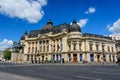 Bucharest, Romania, 6 May 2021: The Central University Library with equestrian monument to King Carol I in front of it in