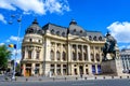 Bucharest, Romania, 6 May 2021: The Central University Library with equestrian monument to King Carol I in front of it in