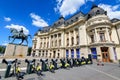 Bucharest, Romania, 6 May 2021: The Central University Library with equestrian monument to King Carol I in front of it in