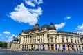 Bucharest, Romania, 6 May 2021: The Central University Library with equestrian monument to King Carol I in front of it in