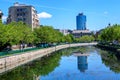 Bucharest, Romania, 9 May 2021 - Old buildings near Natiunile Unite Square Piata Natiunile Unite and bridge on Dambovita river Royalty Free Stock Photo