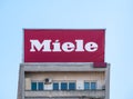 Miele company logo on a outdoor sign board. Miele is a German manufacturer of high-end domestic