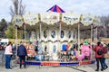Bucharest, Romania - 28 November 2021: Colorful children carousel with toys at a Christmas Market in Drumul Taberei Park Parcul