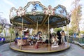 Bucharest, Romania, 13 November 2021: Colourful children colorful carousel with mixed plastic and metallic toys and materials in