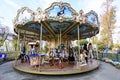 Bucharest, Romania, 13 November 2021: Colourful children colorful carousel with mixed plastic and metallic toys and materials in