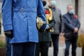 Details of a Romanian army officer holding his service cap during a silent prayer