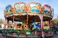 Bucharest, Romania, 30 November 2023: Vivid colorful carousel at the West Side Christmas Market in Drumul Taberei neignbourhood,