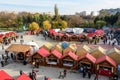 Bucharest, Romania, 30 November 2023: Vivid colorful houses with traditional products for sale at the West Side Christmas Market