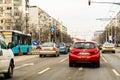 Cars on the road in traffic in Targoviste, Romania captured from the windshield