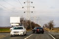 Cars transporting and merging on a long road in Targoviste, Romania