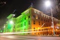 City Hall Primaria Bucuresti on Regina Elisabeta Boulevard, at night, illuminated in green as a symbol for oxygen.