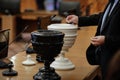 Details with Romanian MP casting a secret vote with black and white balls Blackballing in black and white urns - secret ballot Royalty Free Stock Photo