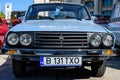 Bucharest, Romania, 2 October 2021: Old vivid blue Romanian Dacia 1310 TX classic car produced in year 1987 parked in a street at