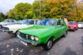 Bucharest, Romania, 24 October 2021: Old vivid green Romanian Dacia 1310 TX classic car produced in year 1987 parked in a street