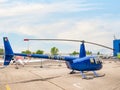 Robinson R44 Clipper II hellicopter parked on the platform Royalty Free Stock Photo