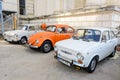 Bucharest, Romania, 2 October 2021: White and vivid orange Fiat, Volkswagen Beetle and Trabant vintage cars produced in Italy Royalty Free Stock Photo