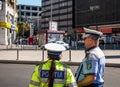 Bucharest/Romania - 09.27.2020: Romanian police officers supervising traffic in the center of Bucharest, Unirii Square