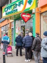 Bucharest/Romania -11.20.2020: Senior people waiting in line at the drugstore. Outside queue at Catena pharmacy