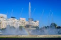 Decorative fountain with small water drops in Unirii Square (Piata Unirii) in the city Royalty Free Stock Photo