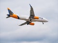 HiSky Airways Airbus A320-200 flying against blue sky. Airplane takes off from Henry Coanda