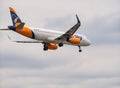 HiSky Airways Airbus A320-200 flying against blue sky. Airplane takes off from Henry Coanda