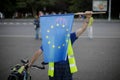 A man holds an European Union flag during an anti-government protest in Bucharest