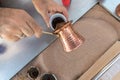 Bucharest, Romania, 21st of September 2019: Turkish coffee made with hot sand preparation