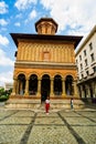 Bucharest, Romania - 2019. Woman in front of the Kretzulescu Church Biserica Kretzulescu in Bucharest, Romania