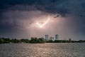 Lightning storm over the city in summer time Romania heavy rain Royalty Free Stock Photo