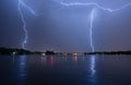 Lightning storm over the city in summer time Romania heavy rain Royalty Free Stock Photo