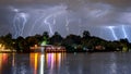 Bucharest summer lightning storm in Herastrau lake Royalty Free Stock Photo