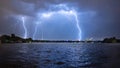 Bucharest summer lightning storm in Herastrau lake Royalty Free Stock Photo