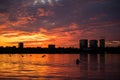 Bucharest sunset on Herastrau lake with kayak , people having relaxing and fun time