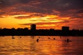 Bucharest sunset on Herastrau lake with kayak , people having relaxing and fun time