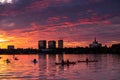 Bucharest sunset on Herastrau lake with kayak , people having relaxing and fun time