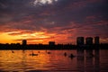 Bucharest sunset on Herastrau lake with kayak , people having relaxing and fun time