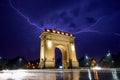 Bucharest Triumph Arch in the light storm by night Royalty Free Stock Photo