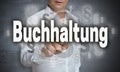 Buchhaltung in german Accounting touchscreen is operated by ma Royalty Free Stock Photo