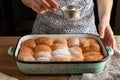 Buchty - Czech sweet buns made of yeast dough - dusting with sugar