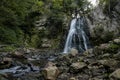 Bucias waterfall in mountains in Romania near Onesti city