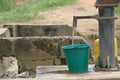 Bucket being filled at African well.
