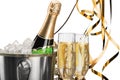 Bottle of Champagne in Ice Bucket with Flutes and Royalty Free Stock Photo