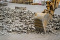 Bucket escalator dismantle the stone in city