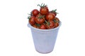 A bucket filled with ripe tomatoes Royalty Free Stock Photo