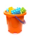 Bucket full of plastic blocks