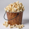 Bucket full of popcorn isolated on a white background. Royalty Free Stock Photo